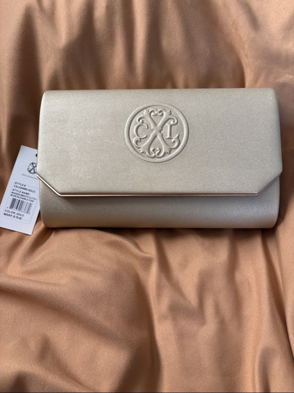 NWT - Christian Lacroix Elegant Gold Women's Clutch Bag with Embossed Logo